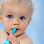 Child brushing teeth