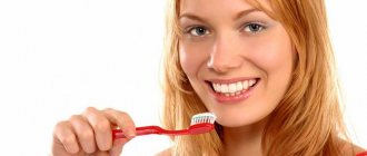 Woman brushing her teeth